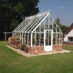 Robinsons Roedean low wall greenhouse in White
