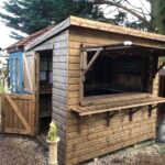 Topwood Garde Bar 8 x 6, pressure treated, solvent treated, stable door in lieu, additional 16" workbenches, heavy duty 15mm cladding