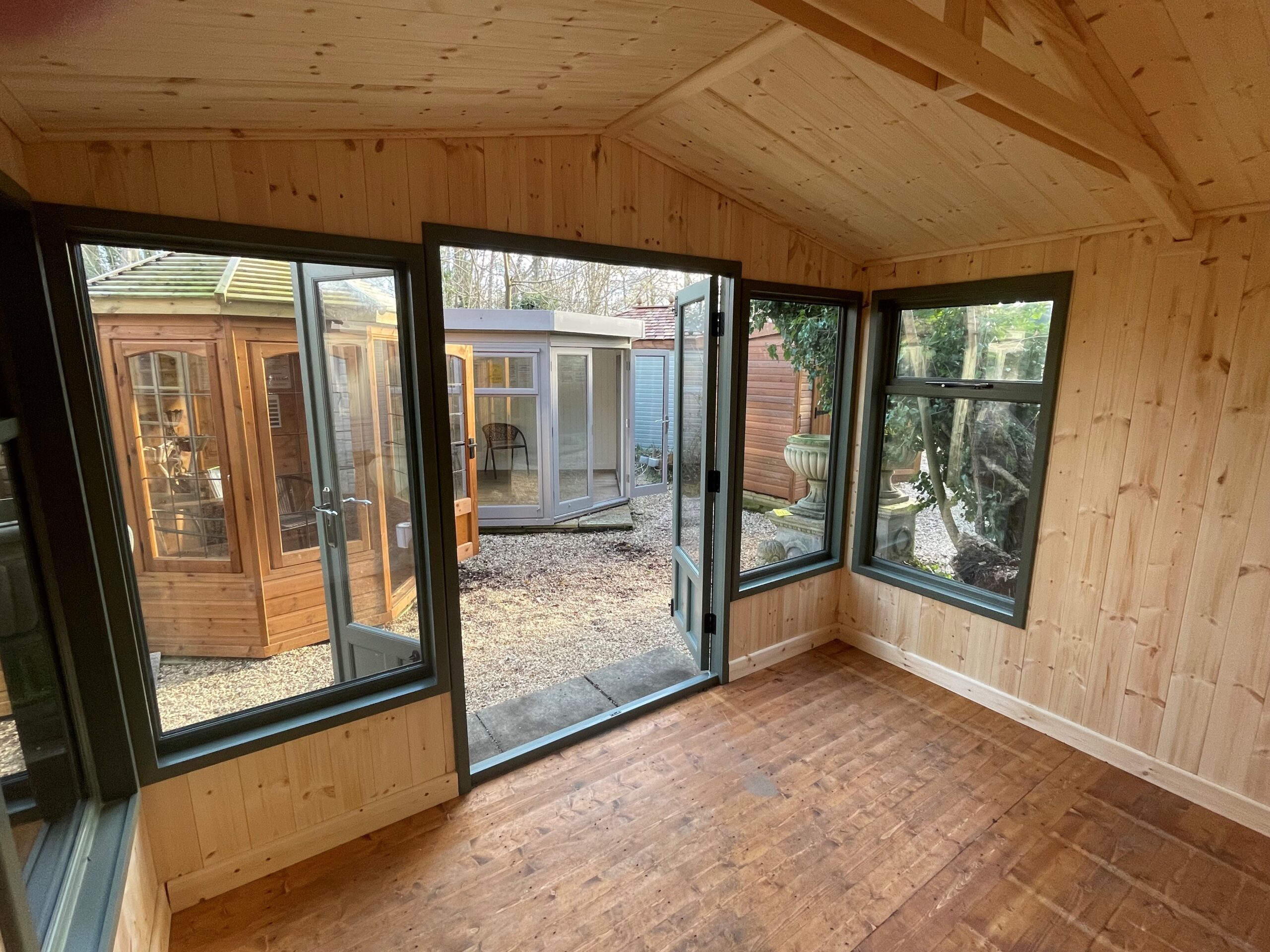 Malvern Studio Apex 10 x 8 - INTERNAL - Rush Green - 3 quarter length glazing - T&G lining & insulation - Black fittings - Black felt tile roof